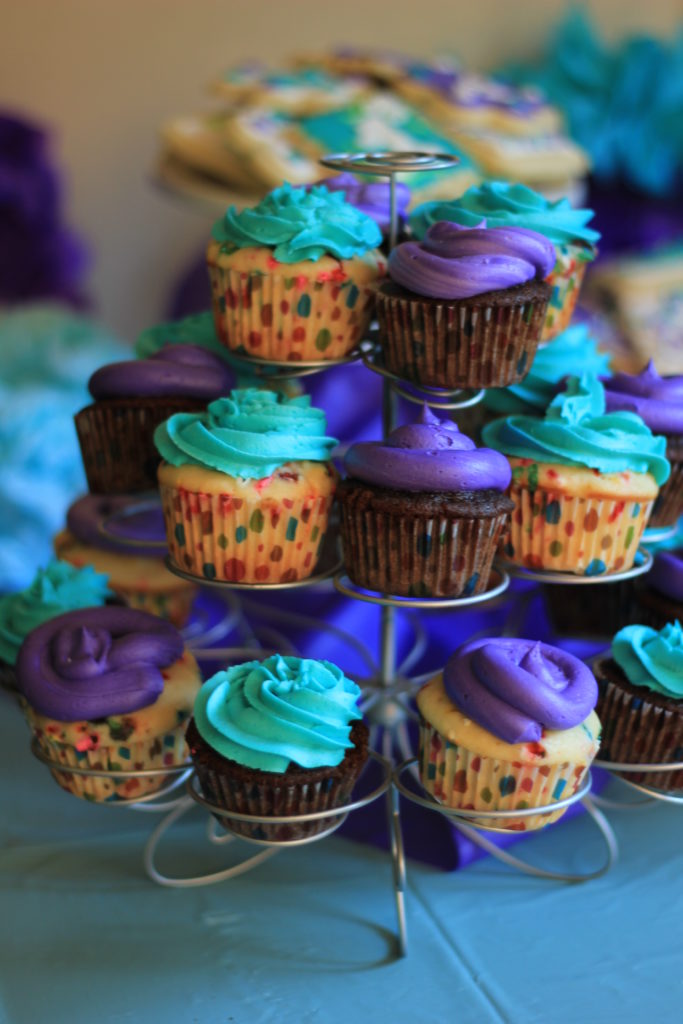 A purple and turquoise first birthday theme, that is easy to do on your own! 
