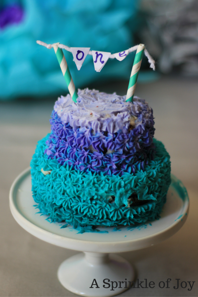A purple and turquoise first birthday theme, that is easy to do on your own! 