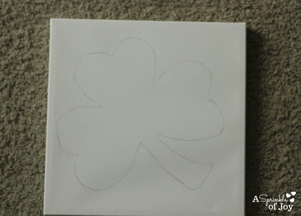 Looking for a fun and easy craft to do for St. Patrick's Day? Check out this shamrock button art. Its quick to do, and turns out super cute.