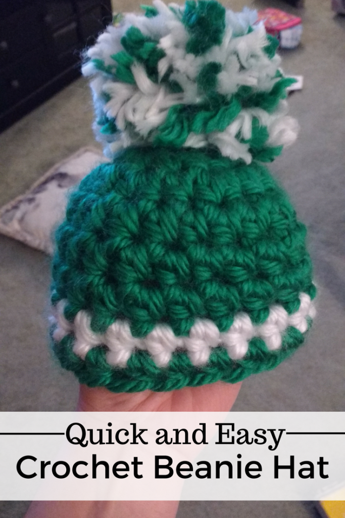 A super quick and easy crochet beanie with a yarn pom-pom.