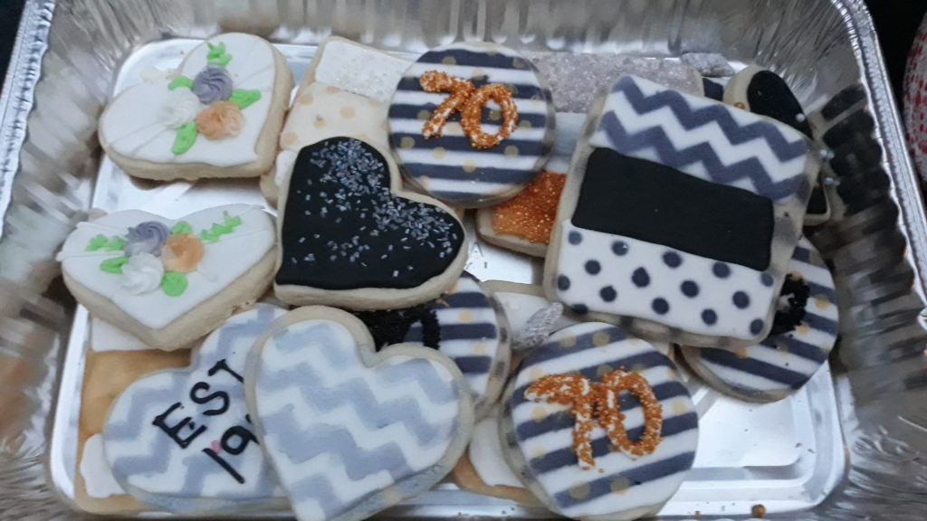 Tips on how to throw an epic surprise party.  Ideas for center pieces, food, and much more. #surpriseparty #birthday #70thbirthday