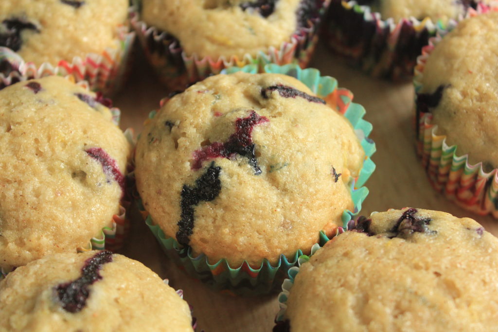 Easy recipe for homemade blueberry muffins with lemon and applesauce.  Perfect way to use fresh or frozen blueberries!