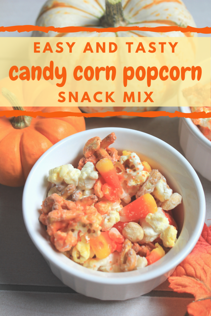 Fast and simple candy corn popcorn recipe.  Quick candy corn popcorn recipe made with melted chocolate. 