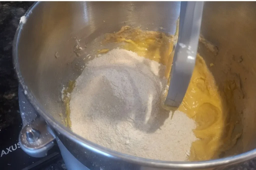mixing dry and wet ingredients for brown butter chocolate chip cookies