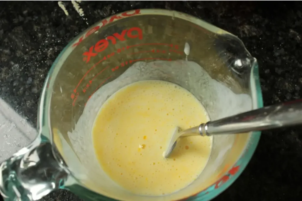 wet scone ingredients in a measuring cup